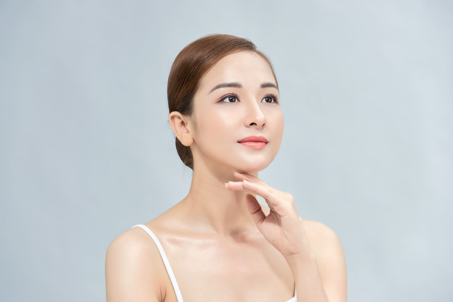 beautiful-asian-woman-with-perfect-makeup-smooth-skin-isolated-color-background-facial-beauty-plastic-surgery-concept
